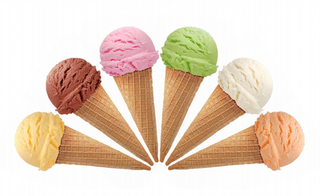 Six cones of different flavored ice creams in shape of semi circle.
